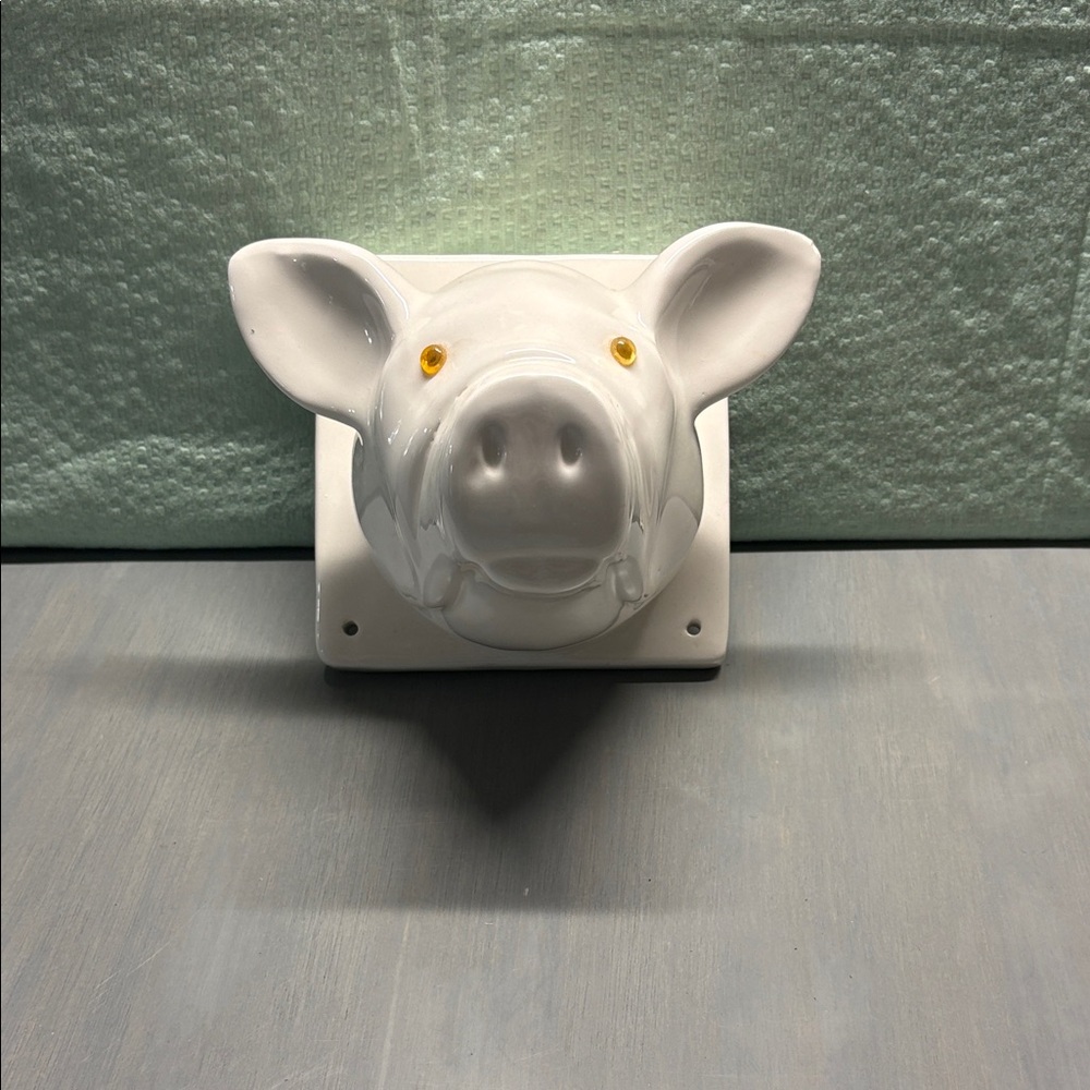 Ceramic Pig Wall Mount with Yellow Eyes